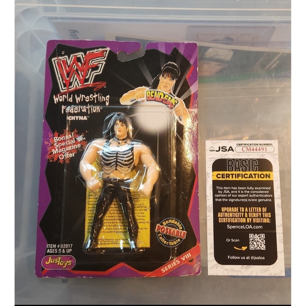Autographed WWF CHYNA BEND-EMS FIGURE IN ORIGINAL PACKAGE WITH COA